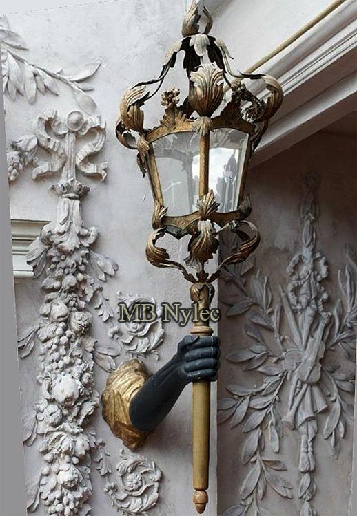 designerskie-kinkiety-kute-kowalstwo-artystyczne.jpg Designerski kinkiet – ręka trzymająca pochodnię ogd81